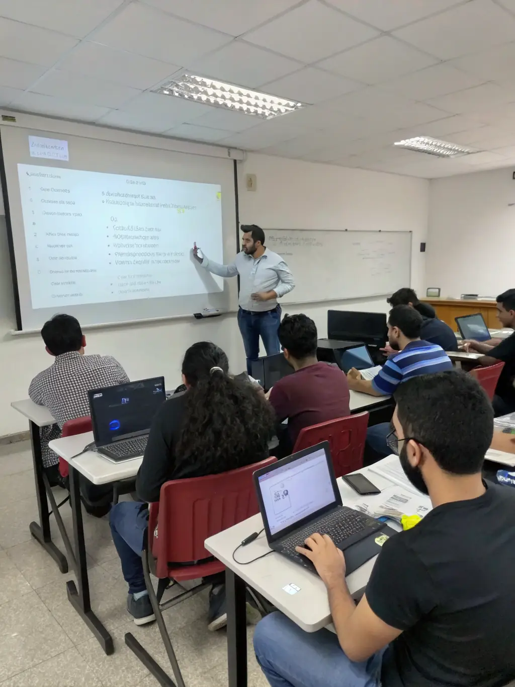 A classroom setting where students are learning about digital archiving and cultural heritage, highlighting ONVIT's educational initiatives.
